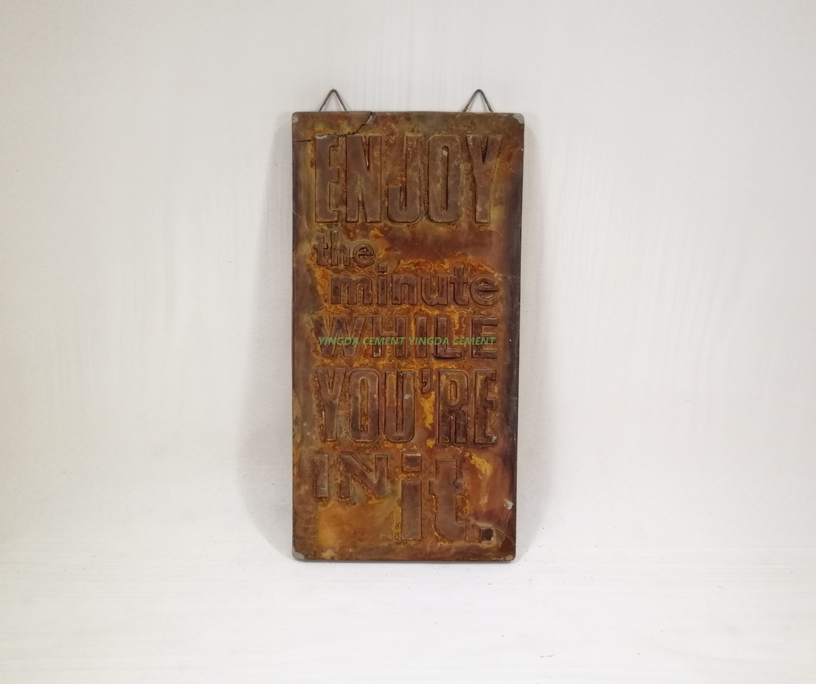 doorplate in cement rust color 