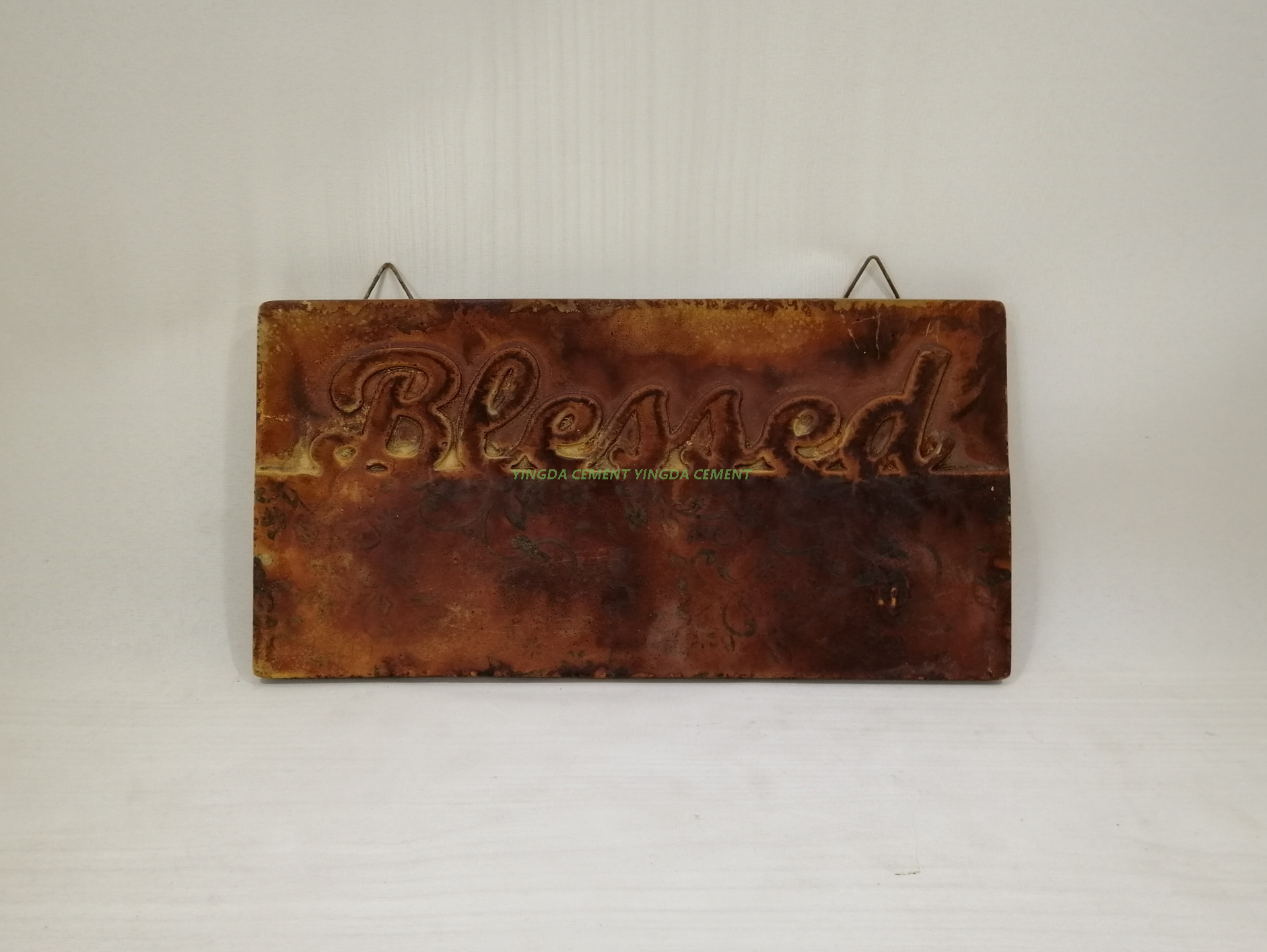doorplate in cement rust color 