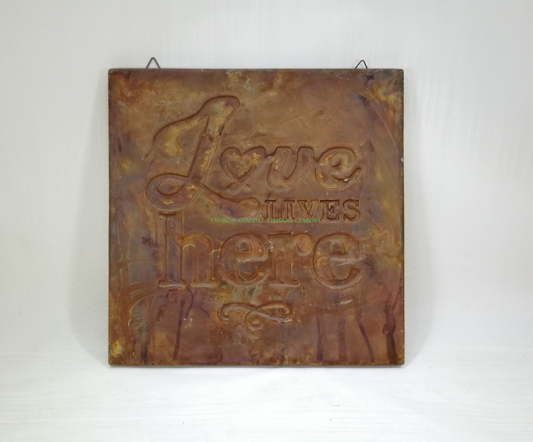 doorplate in cement rust color 