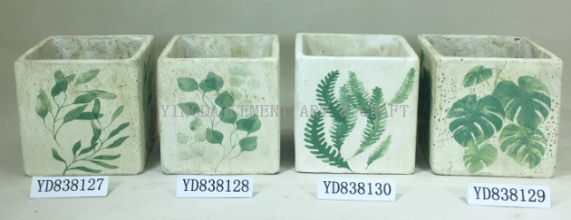 cement round planters with decal