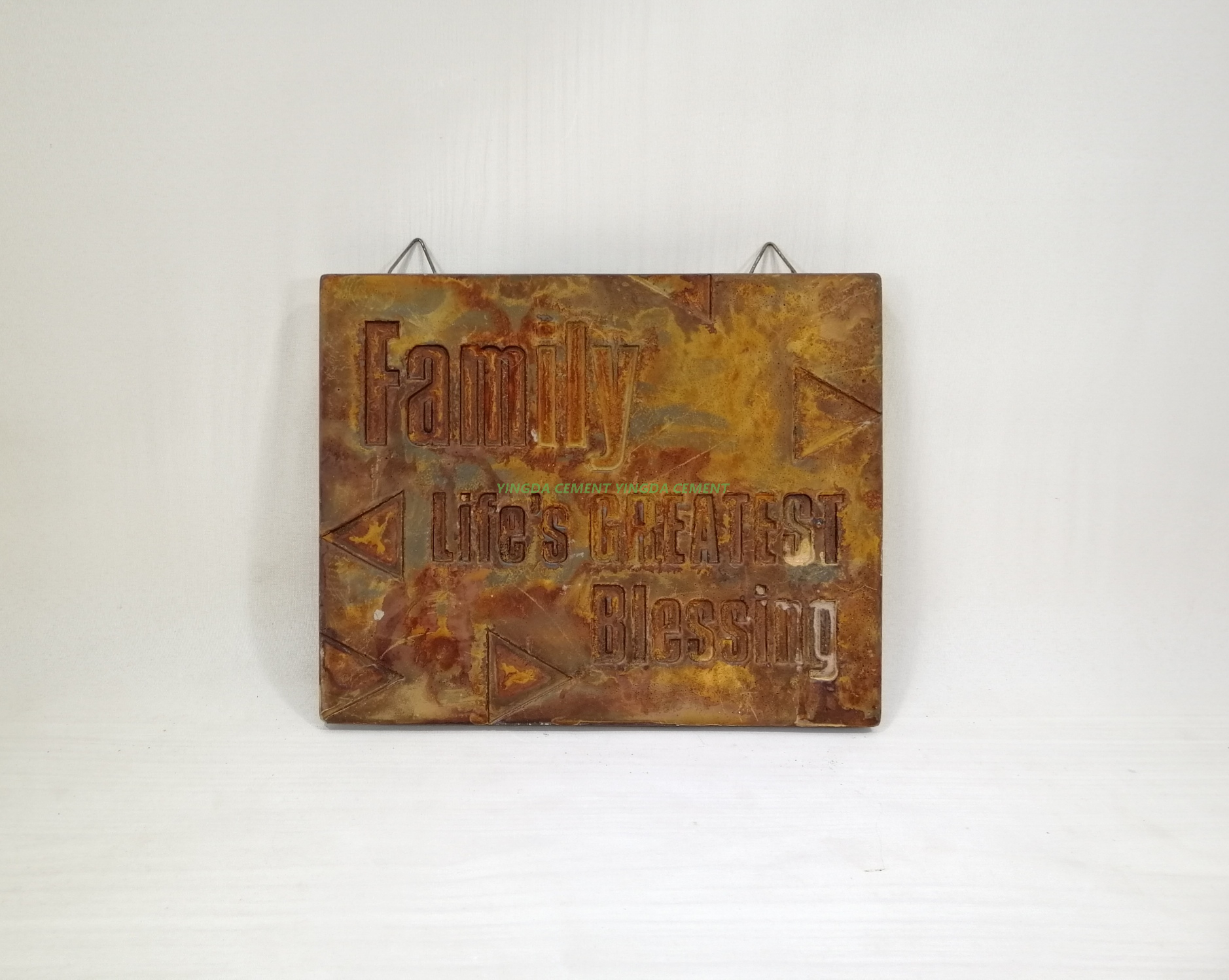 doorplate in cement rust color 